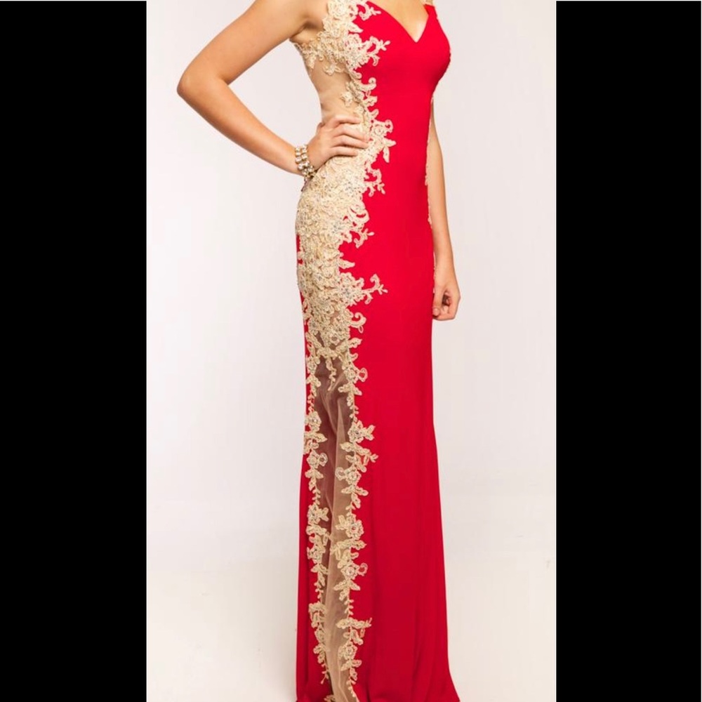 Beautiful Jovani dress. Color is Red/ Nude. Size 6.